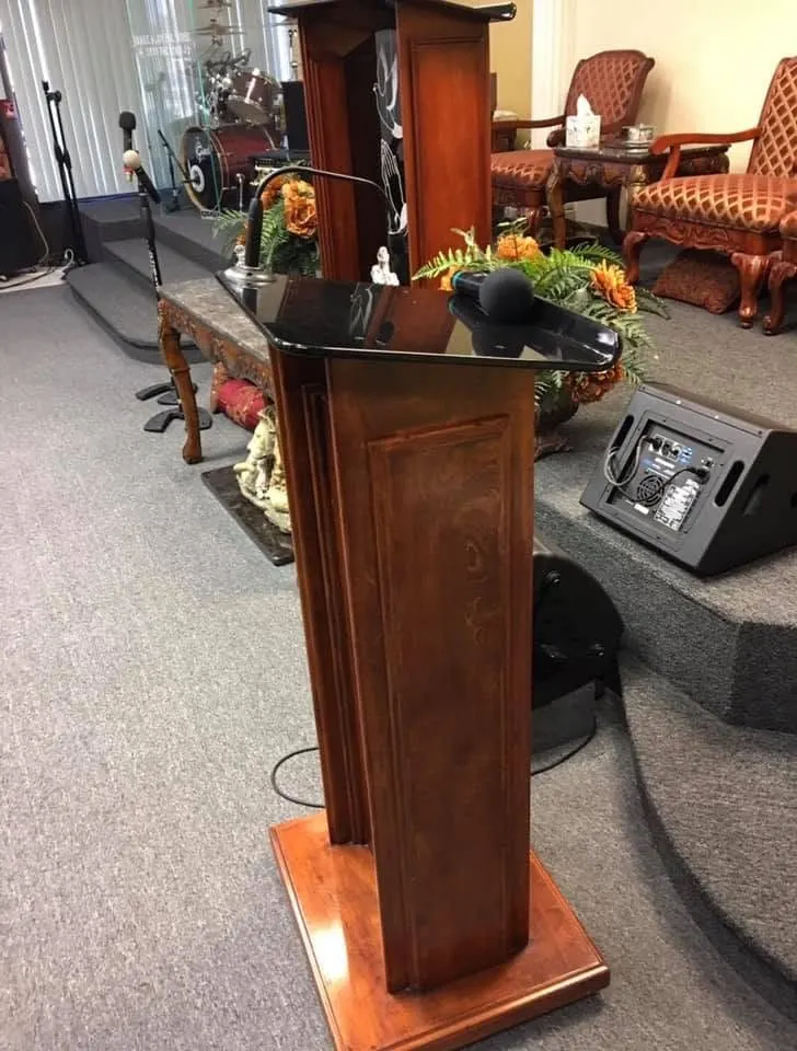 Wood lectern with a raised-panel front